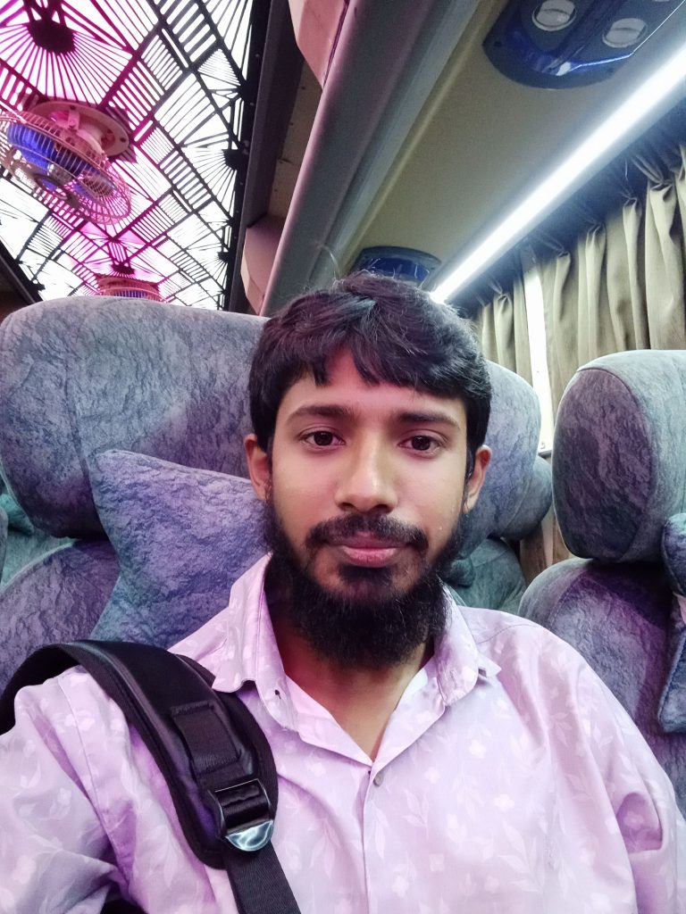 সততা এক্সপ্রেস বাসের ভিতর বসে আছি
